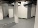 Basement with painted support column, floor, exposed duct work, and storage at 421 W 44Th St, Indianapolis, IN 46208