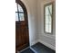 Front door and window create a welcoming and well-lit entryway at 421 W 44Th St, Indianapolis, IN 46208