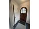 Charming arched front door with coat closet and slate tile flooring at 421 W 44Th St, Indianapolis, IN 46208
