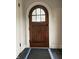 Arched wood front door with glass detail on the interior at 421 W 44Th St, Indianapolis, IN 46208