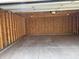 Spacious empty garage with unfinished wood and concrete flooring at 421 W 44Th St, Indianapolis, IN 46208