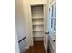 Hallway showing open closet and hardwood floors at 421 W 44Th St, Indianapolis, IN 46208