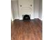Spacious living room boasts stylish hardwood flooring and a classic fireplace at 421 W 44Th St, Indianapolis, IN 46208