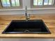 Close up of modern sink with stainless steel faucet and butcher block countertop at 421 W 44Th St, Indianapolis, IN 46208