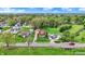 Aerial shot showcasing the house and its location in a residential neighborhood at 429 E Main St, Whiteland, IN 46184