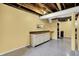 Basement area featuring cabinetry and a utility sink at 429 E Main St, Whiteland, IN 46184