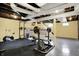 Finished basement with an exercise area, pull up bar and rubber flooring at 429 E Main St, Whiteland, IN 46184