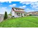 Beautiful two-story home with lush green lawn and inviting front porch at 429 E Main St, Whiteland, IN 46184