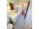 Bathroom featuring a quartz countertop vanity, neutral-toned walls, and updated fixtures at 4305 Lincoln Rd, Indianapolis, IN 46228