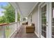 Inviting porch with wicker furniture, ideal for relaxing outdoors at 4904 Kessler Blvd N Dr, Indianapolis, IN 46228
