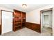 Bedroom with carpet, neutral walls, built in bookcase, and natural light for a cozy and peaceful retreat at 5141 Annette St, Indianapolis, IN 46208