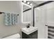 Modern bathroom featuring updated vanity and walk-in shower at 5341 Armstrong Dr, Indianapolis, IN 46237