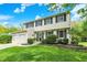 Well-maintained home with a manicured lawn and neatly trimmed shrubs at 5341 Armstrong Dr, Indianapolis, IN 46237