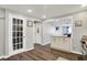 Bright hallway showcases the home's layout, providing access to multiple rooms and highlighting the updated flooring at 5341 Armstrong Dr, Indianapolis, IN 46237