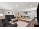 Open-concept living and dining area with stylish furnishings and neutral decor at 5341 Armstrong Dr, Indianapolis, IN 46237