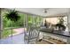 Inviting sunroom with views of the lush backyard at 5341 Armstrong Dr, Indianapolis, IN 46237