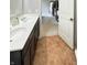 Bathroom featuring double sink vanity, and neutral flooring, offering a functional and stylish space at , McCordsville, IN 46055