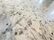 Close-up of a stunning white granite countertop showcasing unique patterns and textures, adding elegance to any kitchen at , McCordsville, IN 46055
