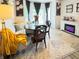 Inviting dining area with large windows, a cozy banquette, elegant lighting, and stylish decor for Gathering meals at , McCordsville, IN 46055