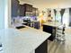 Open kitchen features stainless appliances, granite countertops, and an island with seating at , McCordsville, IN 46055