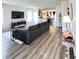 Bright living room with contemporary furnishings flowing into the open kitchen space at , McCordsville, IN 46055