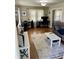 Inviting living room with hardwood floors, natural light, and a comfortable seating area at 5841 E Julian Ave, Indianapolis, IN 46219