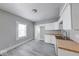 Clean kitchen showcasing butcher block countertops, gray walls, and sleek flooring at 623 Arbor Ave, Indianapolis, IN 46221