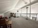 Attic space with dormer, carpet, and railing at 6231 Oak Limb Ct, Indianapolis, IN 46221