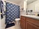 Bathroom featuring a vanity with updated sink and Colts themed decor at 6231 Oak Limb Ct, Indianapolis, IN 46221