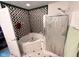 Relaxing bathroom featuring a shower and large soaking tub at 6231 Oak Limb Ct, Indianapolis, IN 46221