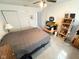 Bedroom featuring a ceiling fan, double door closet and light colored carpet at 6231 Oak Limb Ct, Indianapolis, IN 46221