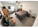 Bedroom with a ceiling fan, neutral walls and gray carpeting at 6231 Oak Limb Ct, Indianapolis, IN 46221