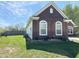 Exterior view shows the property's well-maintained landscaping and architectural details, set in a peaceful neighborhood at 6231 Oak Limb Ct, Indianapolis, IN 46221
