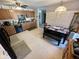 A bright kitchen featuring tile flooring and dining area at 6231 Oak Limb Ct, Indianapolis, IN 46221