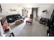 Comfortable living room with vaulted ceiling and a sliding glass door to the outside at 6231 Oak Limb Ct, Indianapolis, IN 46221
