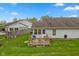 Spacious backyard with wooden deck at 6640 S New Jersey St, Indianapolis, IN 46227
