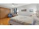 Comfortable bedroom with hardwood floors, natural light, and a soothing color scheme, providing a peaceful retreat at 6640 S New Jersey St, Indianapolis, IN 46227