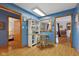 Cozy breakfast nook featuring a small table, open shelving, and natural light at 6640 S New Jersey St, Indianapolis, IN 46227