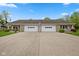Charming duplex with attached garages and a well-manicured lawn provides an inviting curb appeal at 6640 S New Jersey St, Indianapolis, IN 46227