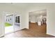 Open floorplan featuring a view from the living room into a modern kitchen with stainless appliances at 7136 Jackson Dr, Cumberland, IN 46229