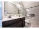 Stylish bathroom showcases double vanity with elegant fixtures and walk-in shower at 722 E Minnesota St, Indianapolis, IN 46203