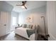 Well-lit bedroom with a daybed, ceiling fan, soft textures, and a cozy atmosphere at 722 E Minnesota St, Indianapolis, IN 46203