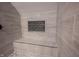Shower detail shows tiled walls, bench seat, and patterned tile niche at 722 E Minnesota St, Indianapolis, IN 46203
