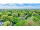 Residential area featuring a harmonious blend of green spaces and well-kept homes nestled among mature trees at 7804 Wawasee Dr, Indianapolis, IN 46250