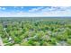 Real estate highlighting neighborhood with lush trees, manicured lawns, and well-maintained homes in quiet setting at 7804 Wawasee Dr, Indianapolis, IN 46250