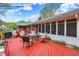 Exterior view of a beautiful, spacious back deck with patio furniture at 7804 Wawasee Dr, Indianapolis, IN 46250