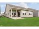 Charming backyard featuring a covered patio, lush lawn, creating a relaxing outdoor space at 796 Sapp Cir, Westfield, IN 46074