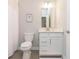 Well-lit bathroom featuring modern fixtures, a toilet, and a vanity with ample storage at 796 Sapp Cir, Westfield, IN 46074