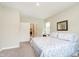 Comfortable bedroom with neutral walls and access to the ensuite bathroom at 796 Sapp Cir, Westfield, IN 46074