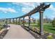 Scenic community path with a pergola, offering a tranquil setting for walking and enjoying nature at 796 Sapp Cir, Westfield, IN 46074
